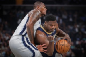 <strong>Memphis Grizzlies forward Xavier Tillman Sr. (2) guards New Orleans Pelicans forward Zion Williamson (1) on Oct. 25, 2023.</strong> (Patrick Lantrip/The Daily Memphian)