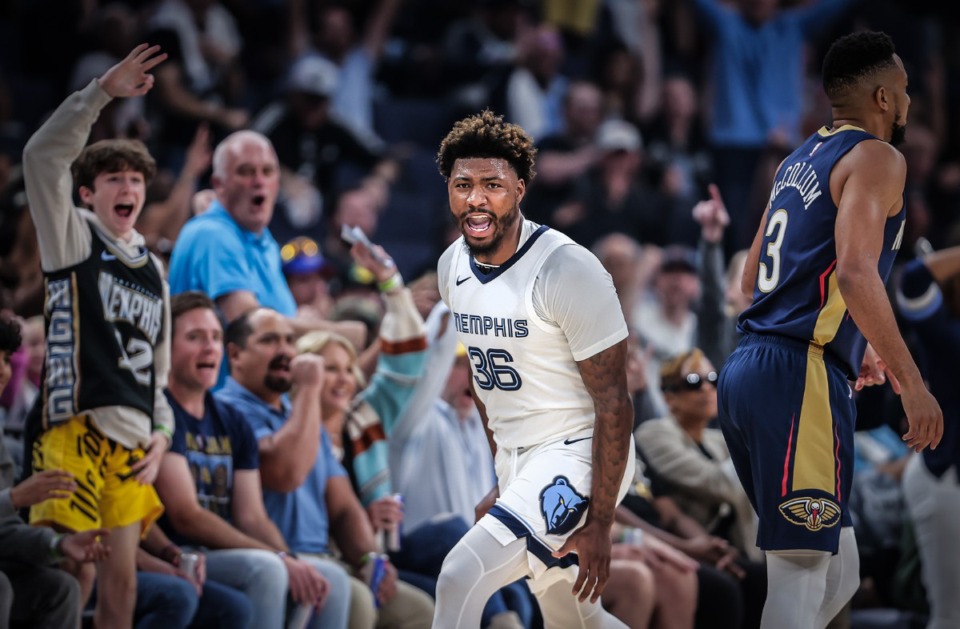 <strong>Memphis Grizzlies guard Marcus Smart (36) celebrates his first points with the Memphis Grizzlies on Oct. 25, 2023, in the season opener against the New Orleans Pelicans.</strong> (Patrick Lantrip/The Daily Memphian)