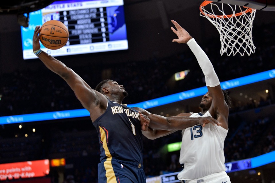 <strong>New Orleans Pelicans forward Zion Williamson (1) goes for a shot against Memphis Grizzlies forward Jaren Jackson Jr. (13) on Oct. 25, 2023.</strong> (Brandon Dill/AP)
