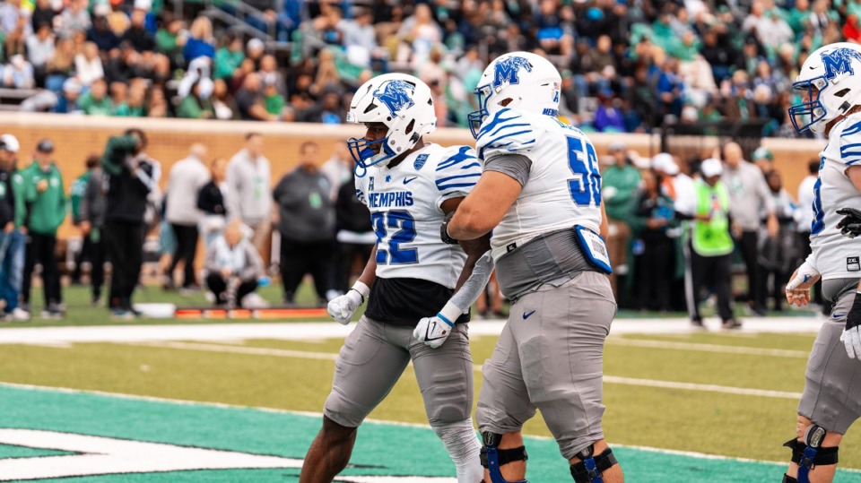 <strong>Running back Brandon Thomas (with offensive lineman Davion Carter) reacts after scoring a touchdown, Saturday, Oct. 28, 2023 as the Tigers play the North Texas Mean Green at the DATCU Stadium in Denton, Texas.</strong> (Courtesy Memphis Athletics)