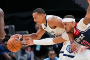 <strong>Memphis Grizzlies guard Desmond Bane drives past&nbsp;Washington Wizards center Daniel Gafford during the second half of an NBA basketball game Saturday, Oct. 28, 2023, in Washington.</strong> (Alex Brandon/AP)