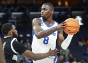 <strong>University of Memphis guard David Jones (right) looks to make a pass against Lane College during action on Sunday, Oct. 29.</strong> (Mark Weber/The Daily Memphian)