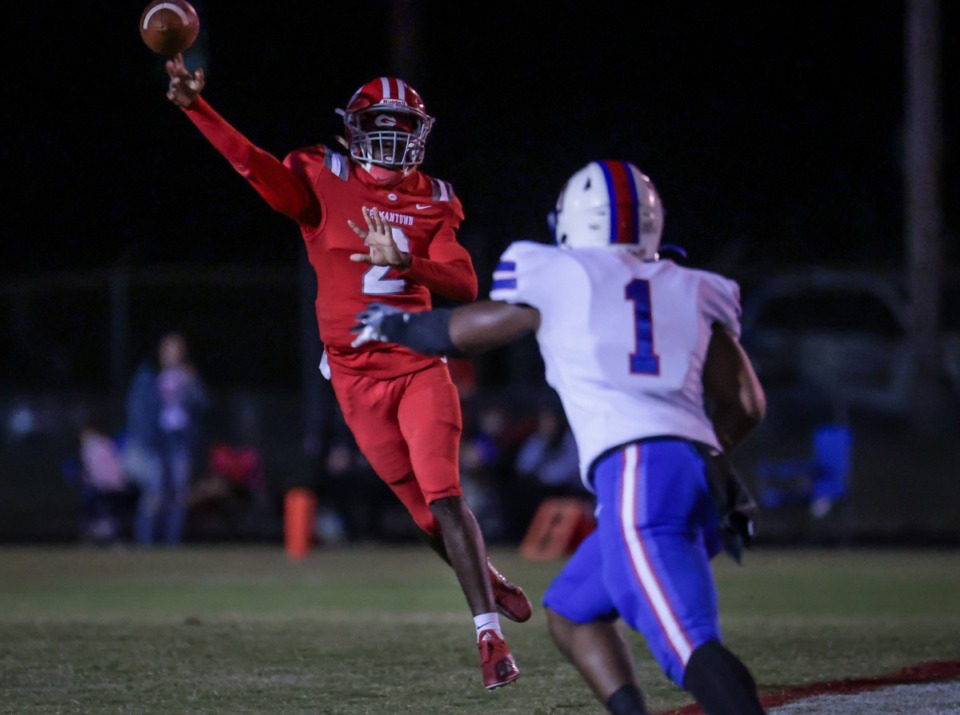 <strong>Germantown quarterback Cordero Walker (2) throws the ball on the run during an Oct. 6, 2023 game against Bartlett.</strong> (Patrick Lantrip/The Daily Memphian)