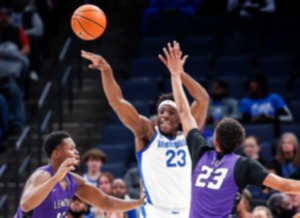 <strong>Memphis Tigers center Malcolm Dandridge (middle) passes against LeMoyne-Owen College on Thursday, Nov. 2, 2023.</strong> (Mark Weber/The Daily Memphian)