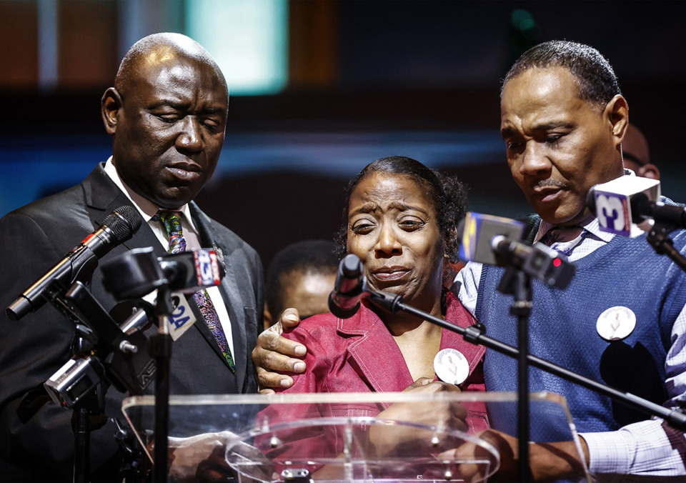 <strong>Laquita Byrd (middle) is comforted by husband Marcus Byrd (right), the parents of the late Deion Byrd, during a press conference Nov. 3. Deion Byrd was fatally stabbed in a holding cell before a court appearance at 201 Poplar.</strong> (Mark Weber/The Daily Memphian)