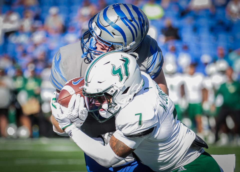 <strong>University of Memphis tight end Brendan Doyle (86) gets hit after a catch during a Nov. 4, 2023 game against USF.</strong> (Patrick Lantrip/The Daily Memphian)