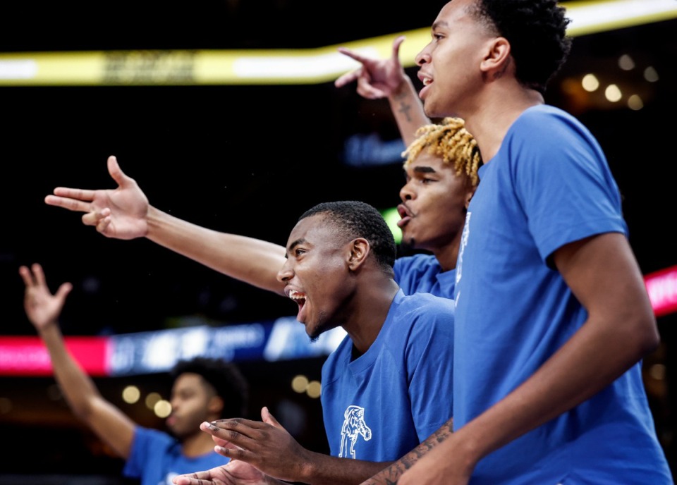 <strong>University of Memphis guard Jayhlon Young (left) celebrates on the bench during action against Jackson State on Monday Nov. 6, 2023.</strong> (Mark Weber/The Daily Memphian)