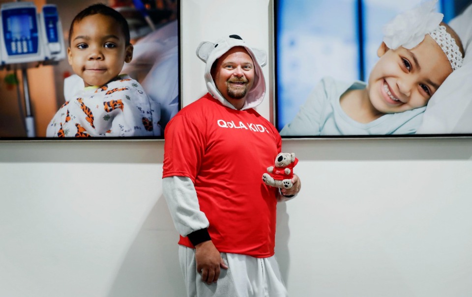 <strong>Dr. Justin Baker, a St. Jude palliative care physician, also leads the QoLA "quality of life for all&rdquo; team. The QoLA team&rsquo;s mascot is a koala bear, and Baker often wears a koala costume while visiting patients.</strong> (Mark Weber/Daily Memphian file)