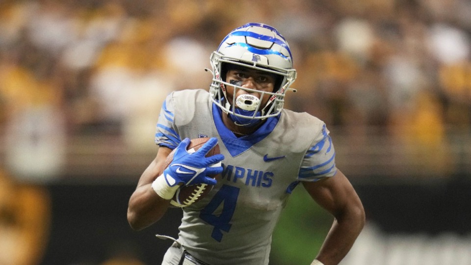 <strong>Memphis running back Blake Watson runs with the ball during the second half of an NCAA college football game against Missouri Saturday, Sept. 23, 2023, in St. Louis.</strong> (Jeff Roberson/AP File)