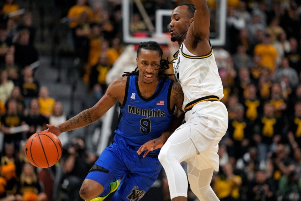 <strong>Memphis' Caleb Mills (9) drives past Missouri's Tamar Bates during the first half of an NCAA college basketball game Friday, Nov. 10, 2023, in Columbia, Mo.</strong> (Jeff Roberson/AP)