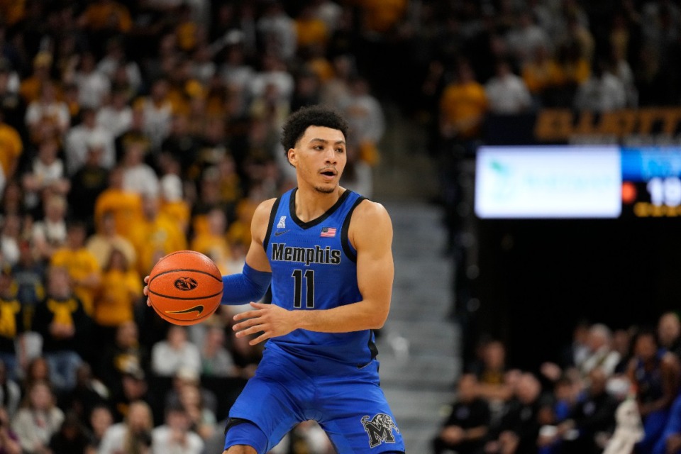 <strong>Memphis' Jahvon Quinerly (11) brings the ball down the court during the first half of an NCAA college basketball game against Missouri Friday, Nov. 10, 2023, in Columbia, Mo.</strong> (Jeff Roberson/AP)