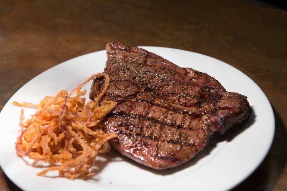 <strong>A 14-day dry-aged bone-in ribeye is one of the items on the menu at Mesquite Chop House in Southaven.</strong> (Courtesy DeSoto County Tourism)