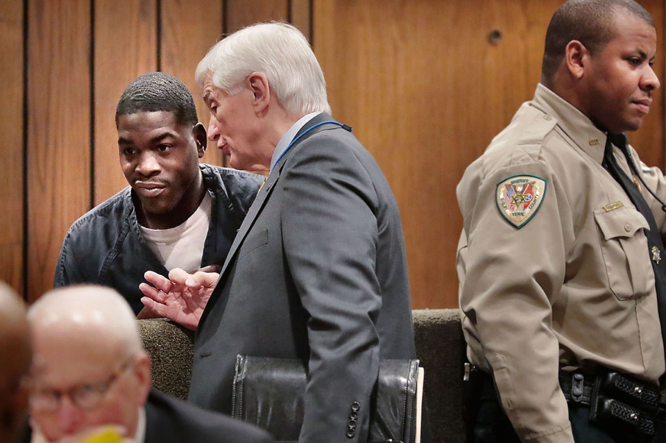 <strong>McKinney Wright, left, talks with his lawyer Bill Massey in Judge Karen Massey's court on Nov. 20, 2018. Wright and Quandarius Richardson are accused of killing Greater Memphis Chamber President Phil Trenary</strong>. (Jim Weber/The Daily Memphian file)
