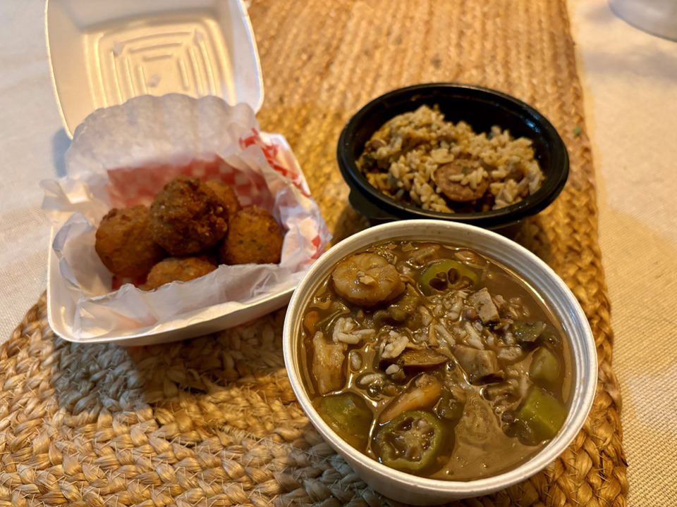 <strong>Gumbo, bottom right, jambalaya, top right, and boudin balls, left, from Crawfish Haven Seafood and Catering.</strong> (Joshua Carlucci/Special to The Daily Memphian)