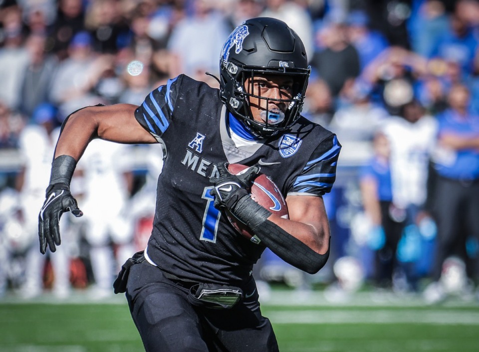 <strong>University of Memphis receiver Tauskie Dove (1) runs after a catch during a Nov. 18, 2023 game against SMU.</strong> (Patrick Lantrip/The Daily Memphian)