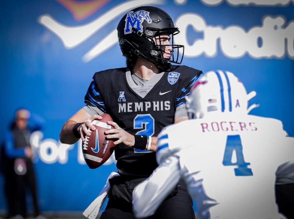 <strong>University of Memphis quarterback Seth Henigan (2) looks for an open receiver during a Nov. 18, 2023 game against SMU.</strong> (Patrick Lantrip/The Daily Memphian)