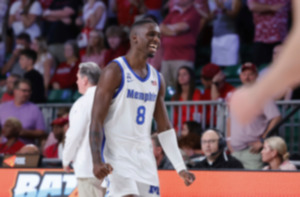 <strong>David Jones celebrates the Memphis Tigers&rsquo; win over Arkansas in the semifinals of the Battle 4 Atlantis at Paradise Island, Bahamas, Thursday, Nov. 23, 2023.</strong> (Tim Aylen/Bahamas Visual Services via AP)