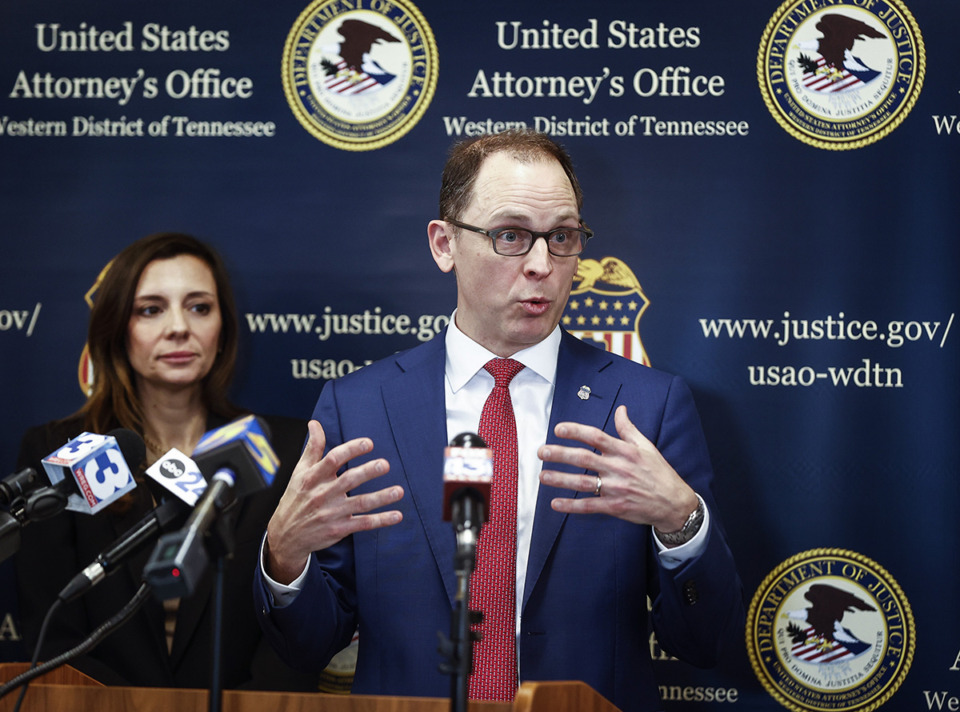 <strong>United States Attorney of the Western District of Tennessee Kevin G. Ritz, middle, speak along with Assistant U.S. Attorney General Nicole Argentieri, left, during a press conference announcing the Justice Department&rsquo;s efforts to reduce violent crimes in Memphis.</strong> (Mark Weber/The Daily Memphian)