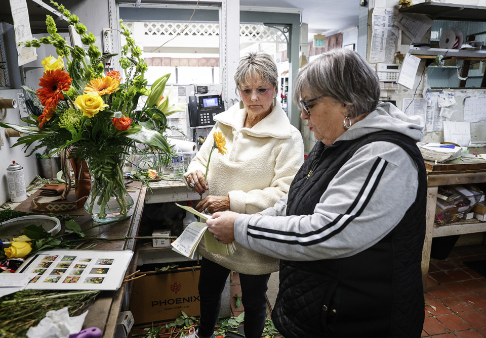 <strong>Rachel&rsquo;s Flower Shop designer Sherry Howell, left, works with Susan Leigh on Tuesday, Nov. 28, 2023. Rachel&rsquo;s, one of the oldest floral businesses in the city, will continue as a concierge florist at the end of the year. The building is for sale.</strong>&nbsp;(Mark Weber/The Daily Memphian)