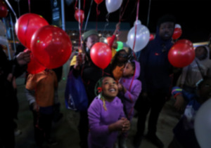 <strong>Jaliyah Williams laughs in anticipation of the balloon release at the Shelby County Health Department's annual World AIDS Day event at FedExForum Dec. 1, 2022.</strong> (Patrick Lantrip/The Daily Memphian file)