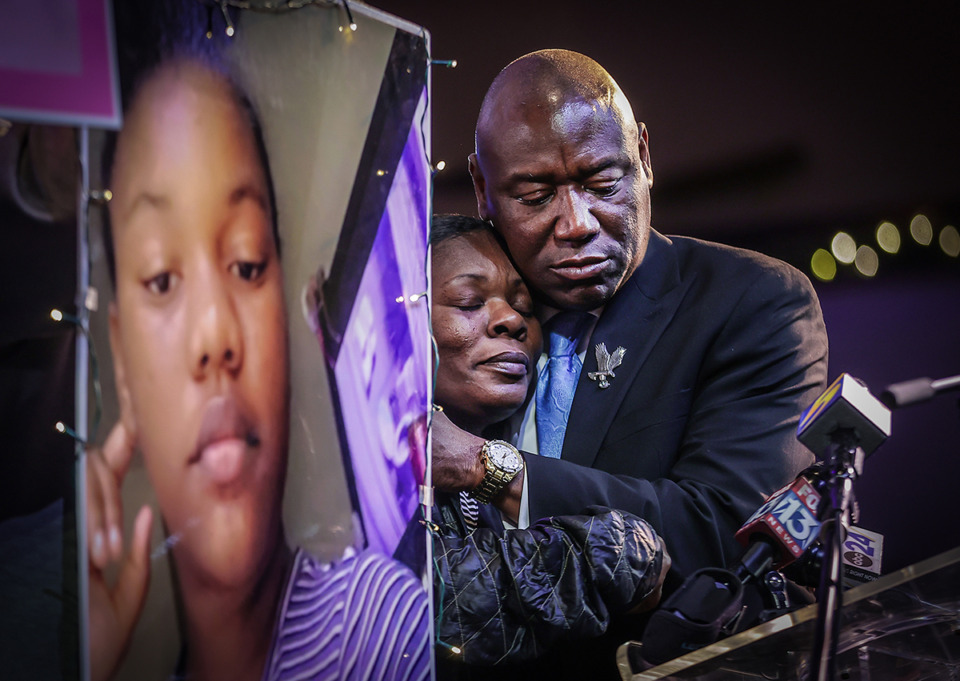 <strong>Attorney Ben Crump hugs Shaona Garner-White, the mother of Alegend Jones, a teenager who died while in the care of Youth Villages, at a Nov. 29, 2023 press conference at Mississippi Boulevard Christian Church.</strong> (Patrick Lantrip/The Daily Memphian)