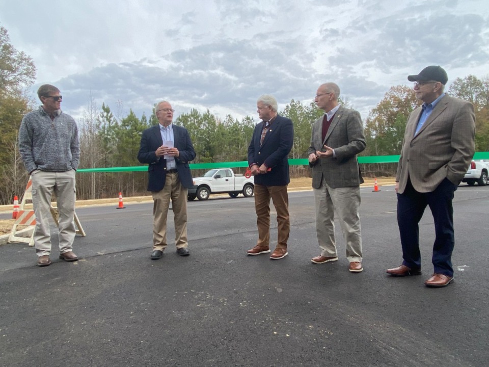 <strong>(Left to right) Current Bartlett Director of Engineering John Horne, previous Director of Engineering Rick McClanahan, Mayor David Parsons, State Senator Brent Taylor and former Bartlett Mayor A. Keith McDonald at the&nbsp;ribbon-cutting for Bartlett&rsquo;s New Brownsville Road opening.</strong> (Michael Waddell/Special to The Daily Memphian)