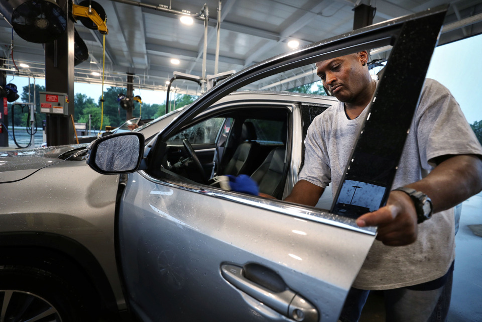 <strong>Service agent Calvin Silas cleans out rental cars at the Memphis International Airport's new consolidated rental car facility on Airways on June 27, 2019. The $33 million maintenance compound has been under construction since fall 2017.&nbsp;</strong>(Jim Weber/Daily Memphian)