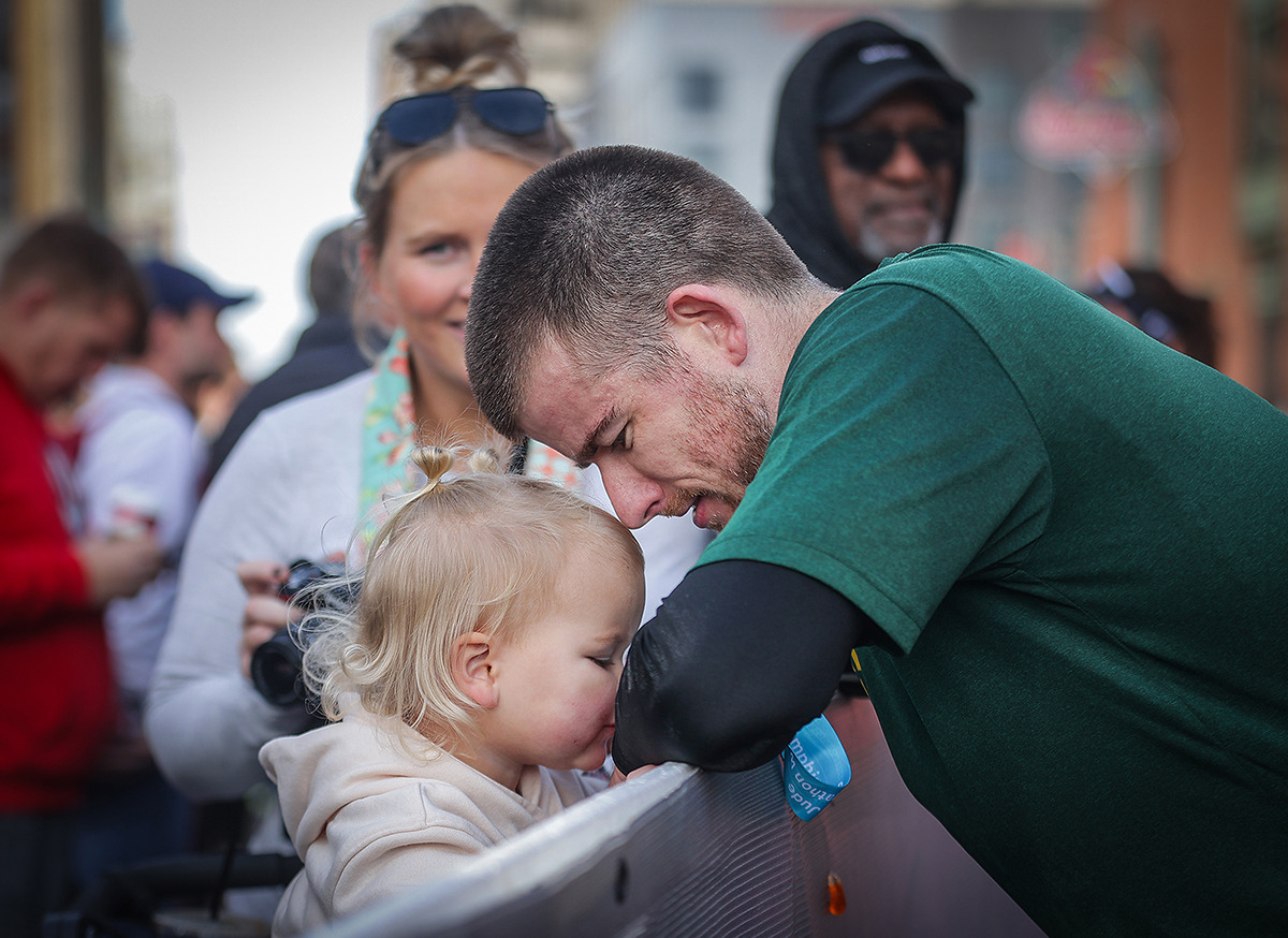 <strong>Caleb Shaw embraces his daughter Murphy, 2, after completing the St. Jude Memphis Marathon Dec. 2.</strong> (Patrick Lantrip/The Daily Memphian)