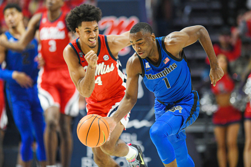 <strong>Memphis Tigers guard Jayhlon Young (1) brings the ball upcourt against Ole Miss Rebels forward Jaemyn Brakefield (4) at the Sandy and John Black Pavilion at Ole Miss Dec. 2.</strong> (Bruce Newman/Special to The Daily Memphian)