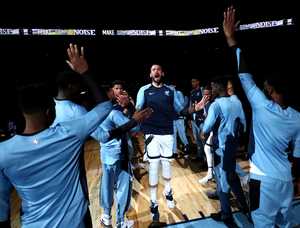 <strong>Grizzlies center Marc Gasol celebrates with teammates as he enters FedExForum for the first pre-season game of the year against the Atlanta Hawks. The Grizzlies beat the Hawks 110-120 in the first pre-season game of the year.</strong> (Houston Cofield/Daily Memphian)