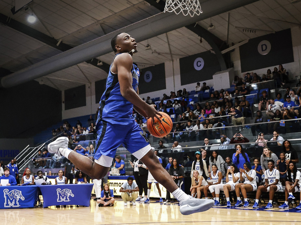 <strong>Tigers guard Jayhlon Young compete in the dunk contest during Memphis basketball&rsquo;s Student Madness event on Wednesday, Oct. 4.</strong> (Mark Weber/The Daily Memphian file)