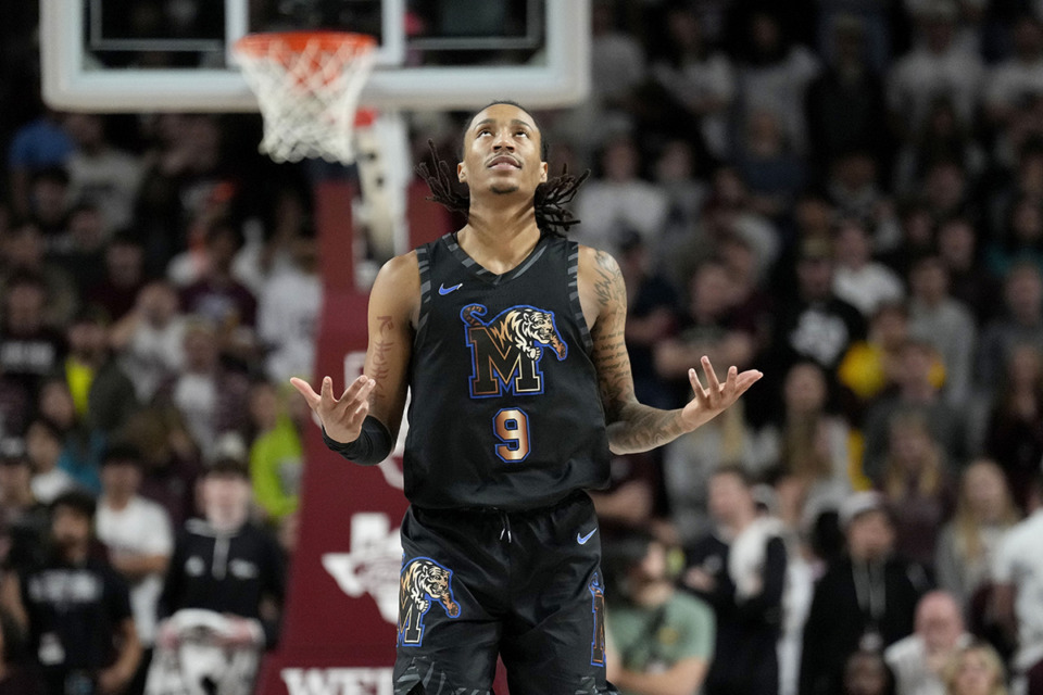 <strong>Memphis guard Caleb Mills (9) reacts after making a 3-point basket against Texas A&amp;M during the second half of an NCAA game Sunday, Dec. 10, in College Station, Texas.</strong> (Sam Craft/AP Photo)