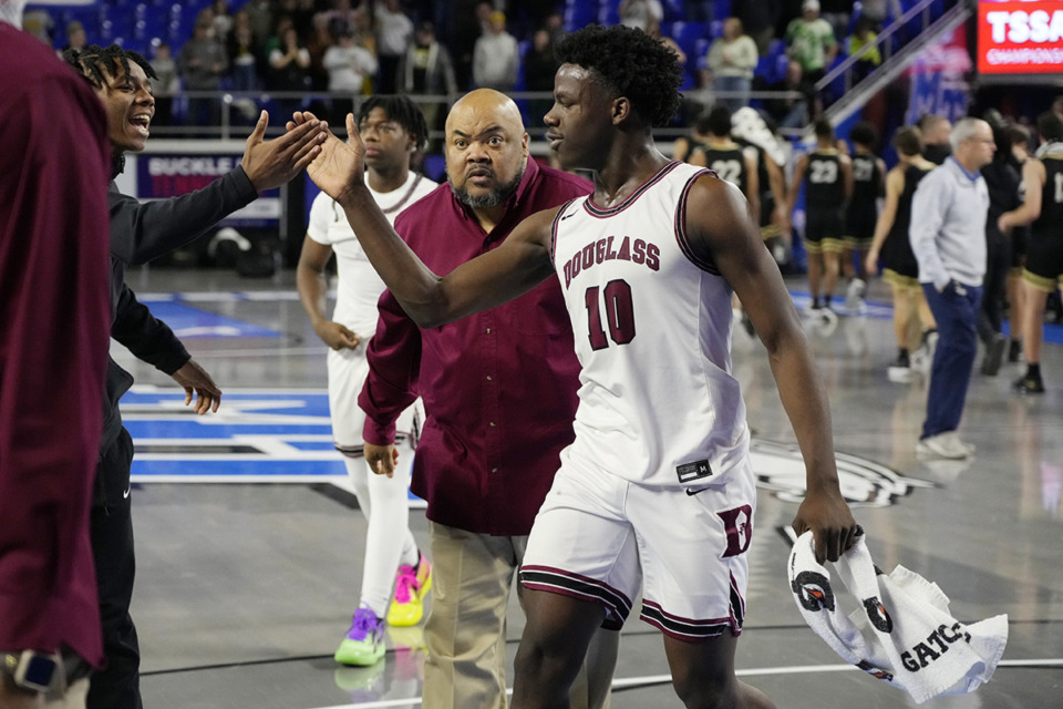 <strong>Douglass forward Jarmon Brittman (10) leaves the court after a win over Giles County in a Class 2A game during the TSSAA boys&rsquo; state basketball tournament Friday, March 17, in Murfreesboro.</strong> (Mark Humphrey/Special to The Daily Memphian file)