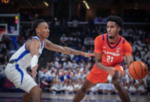 <strong>Memphis guard Caleb Mills guards Clemson forward Chauncey Wiggins (21) during Saturday&rsquo;s game at FedExForum. Memphis upset No. 13 Clemson, 79-77.</strong> (Patrick Lantrip/The Daily Memphian)