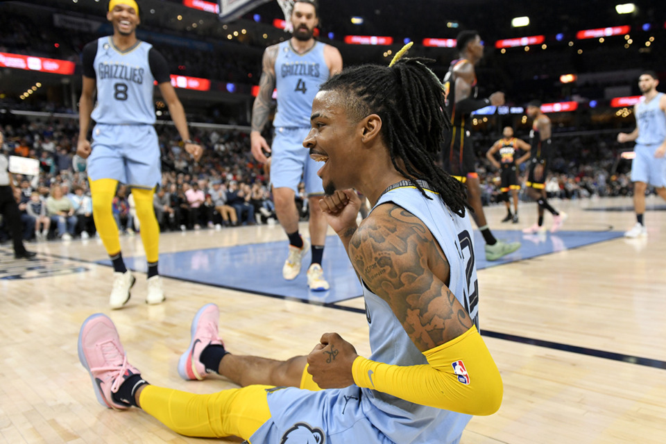 <strong>Memphis Grizzlies guard Ja Morant, foreground, reacts in the second half of an NBA basketball game against the Phoenix Suns on&nbsp; Jan. 16 in Memphis.</strong> (Brandon Dill/AP Photo file)