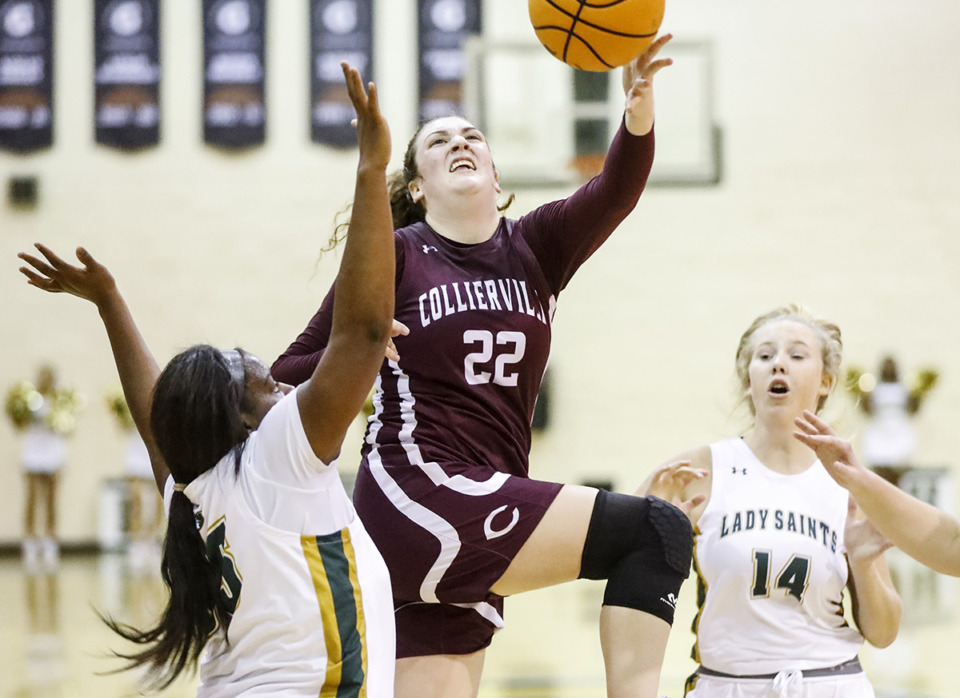 <strong>Collierville forward Carlyn Burdette drives to the basket against Briarcrest during action on Dec. 2, 2022.</strong> (Mark Weber/The Daily Memphian file)