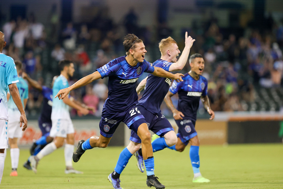 <strong>Nighte Pickering celebrates with his Memphis 901 teammates in a game against Hartford Athletic at AutoZone Park Aug. 6, 2022.</strong> (Courtesy Memphis 901 FC)