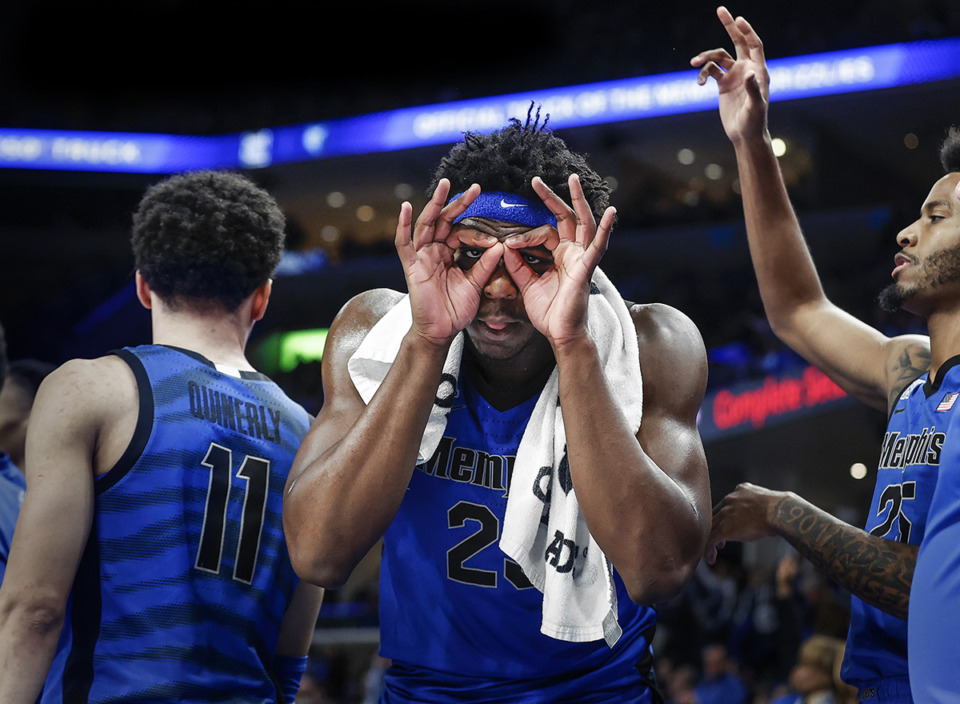 <strong>Memphis Tigers center Malcolm Dandridge (middle) celebrates on the bench during action against Virginia on Tuesday, Dec. 19 at FedExForum. After the game he said,&nbsp;&ldquo;Now it&rsquo;s about heart and effort.&rdquo;</strong> (Mark Weber/The Daily Memphian)