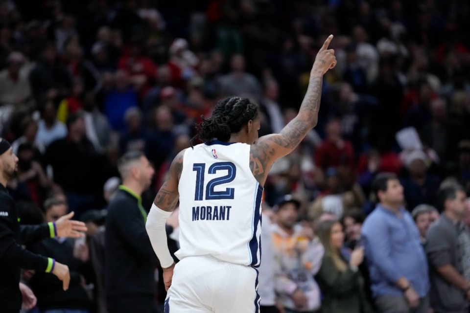 <strong>Memphis Grizzlies guard Ja Morant (12) reacts in the second half of an NBA basketball game against the New Orleans Pelicans in New Orleans, Tuesday, Dec. 19, 2023. The Grizzlies won 115-113.</strong> (AP Photo/Gerald Herbert)