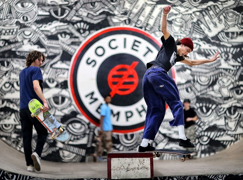 <strong>Skater Adrian Akin (right) grinds one of the rails as Jason Weiner watches at the new Society Skatepark &amp; Coffee, an industrial warehouse in Binghampton that was transformed by local skate enthusiasts Mark Horrocks, Matthew Wrage and Zac Roberts.</strong> (Jim Weber/The Daily Memphian file)