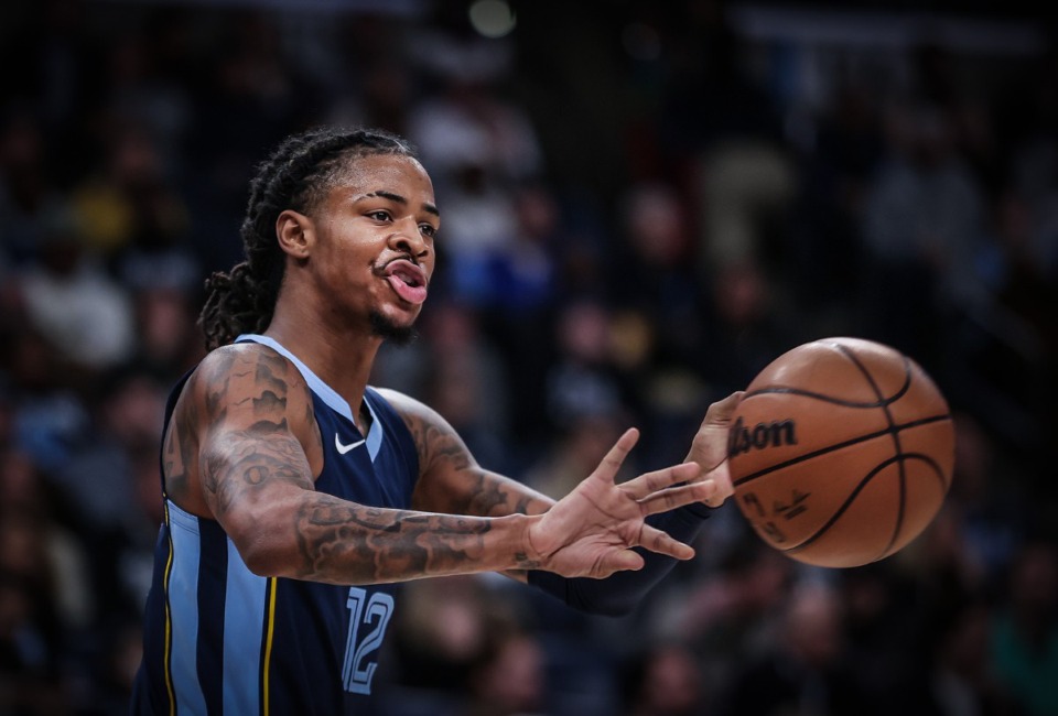 <strong>Memphis Grizzlies point guard Ja Morant (12) throws a pass against the Indiana Pacers on Thursday, Dec. 21. 2023.</strong> (Patrick Lantrip/The Daily Memphian)