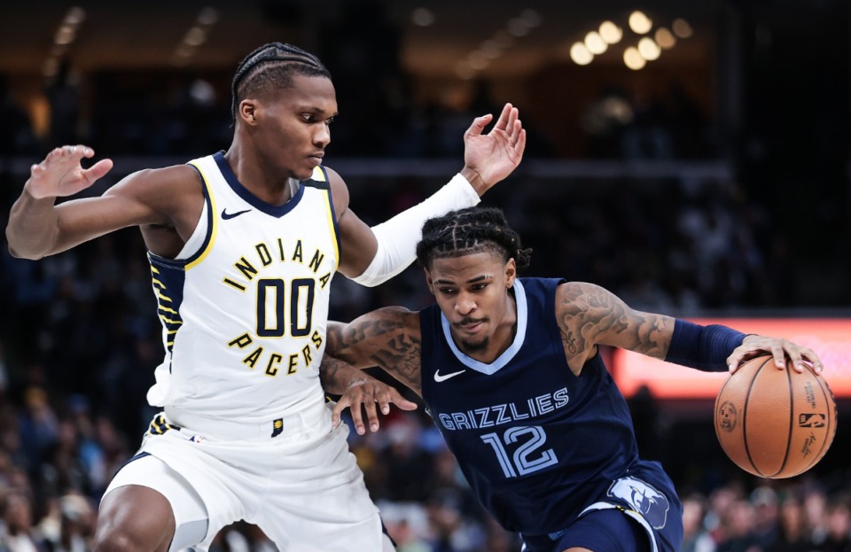 <strong>Grizzlies guard Ja Morant (12) drives to the paint during a Dec. 21, 2023 game against the Indiana Pacers.</strong> (Patrick Lantrip/The Daily Memphian)