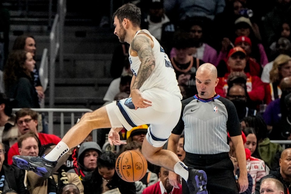 <strong>Memphis Grizzlies guard John Konchar (46) chases a loose ball against the Atlanta Hawks during the first half of an NBA basketball game, Saturday, Dec. 23, 2023, in Atlanta.</strong> (AP Photo/Mike Stewart)