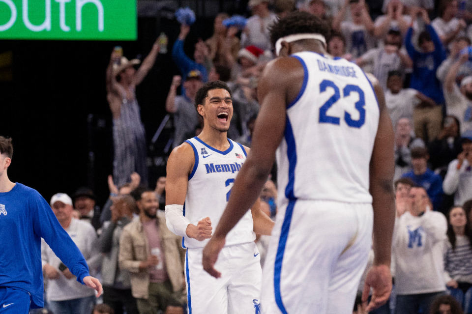 <strong>Memphis forward Nick Jourdain (2) celebrates during the Tigers game against Clemson on Dec. 16. The Tigers continue to climb in Upadhyaya&rsquo;s rankings.</strong> (AP File Photo/Nikki Boertman)