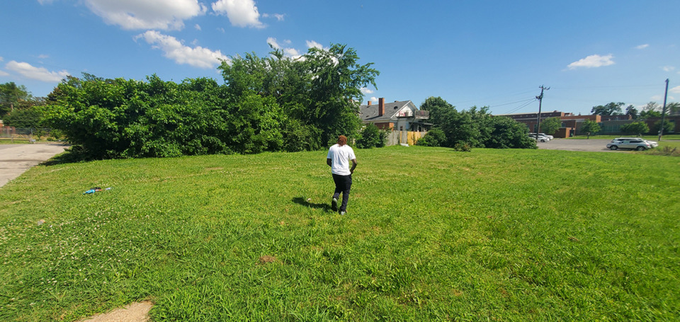 <strong>Tauheed Rahim II walks on the plot of land he bought from his mother.</strong> (Courtesy Tauheed Rahim II)