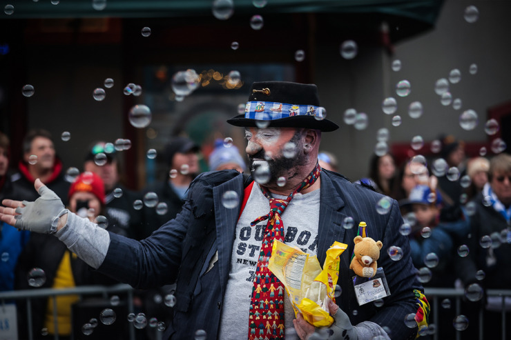 <strong>A Shriner dressed up as a clown hands out candy amid a cloud of bubbles during the AutoZone Liberty Bowl Parade on&nbsp;Beale Street Dec. 28, 2023.</strong> (Patrick Lantrip/The Daily Memphian)