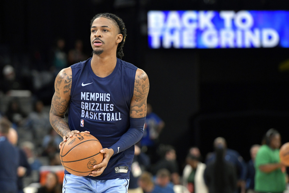 <strong>Memphis Grizzlies guard Ja Morant warms up before an NBA basketball game against the Indiana Pacers Dec. 21 in Memphis.</strong> (Brandon Dill/AP file)