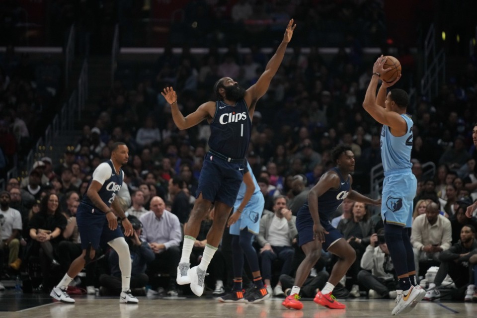 <strong>Memphis Grizzlies guard Desmond Bane (22) shoots against Los Angeles Clippers guard James Harden (1) in Los Angeles, Friday, Dec. 29, 2023.</strong> (Damian Dovarganes/AP)