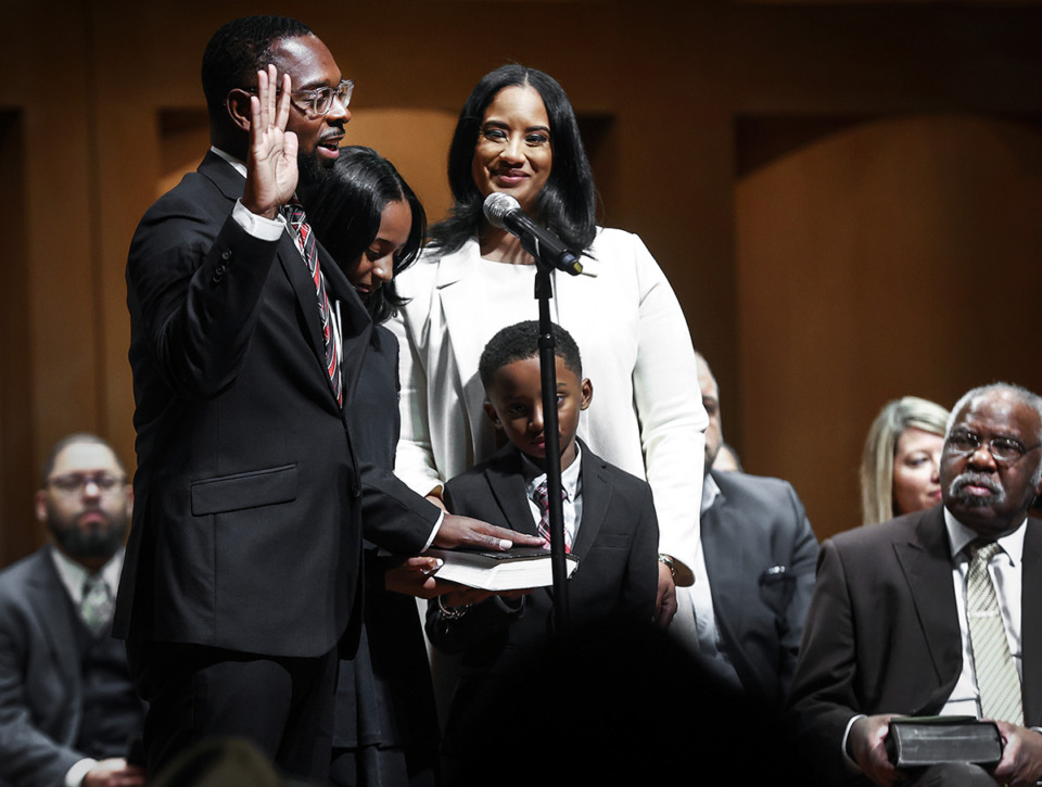 <strong>Newly elected Memphis Mayor Paul Young, left, took the oath of office alongside his family at the Cannon Center.</strong> (Mark Weber/The Daily Memphian)