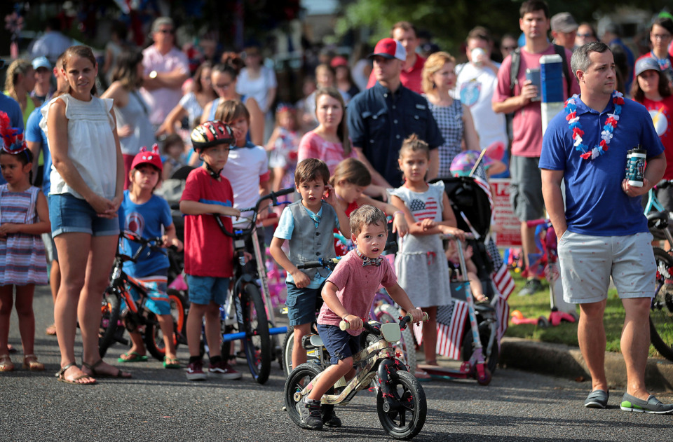 <strong>Parade-goers line up during the 70th annual Independence Day Parade in the High Point Terrace neighborhood on July 4, 2019. Once again East Memphis residents gathered for a patriotic morning of star spangled bikes, waving neighbors and a dousing by the Memphis Fire Department.</strong> (Jim Weber/Daily Memphian)
